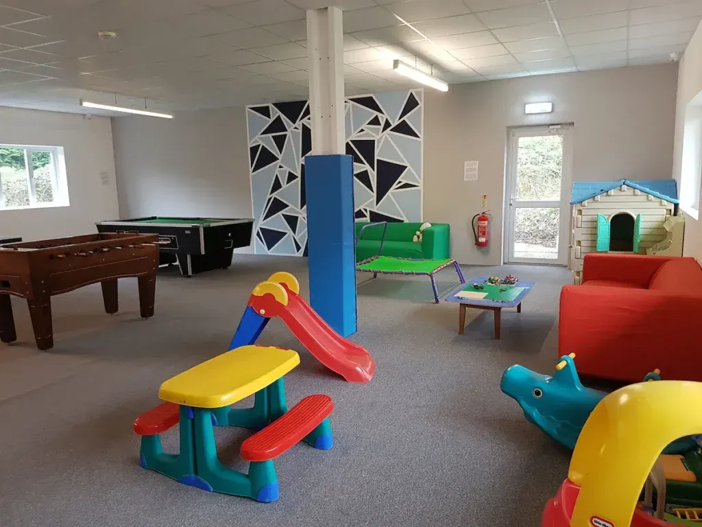 Wagtail Barn, South Devon 2 Shared games room at Newhouse Barton with table football, table tennis and colourful children play equipment